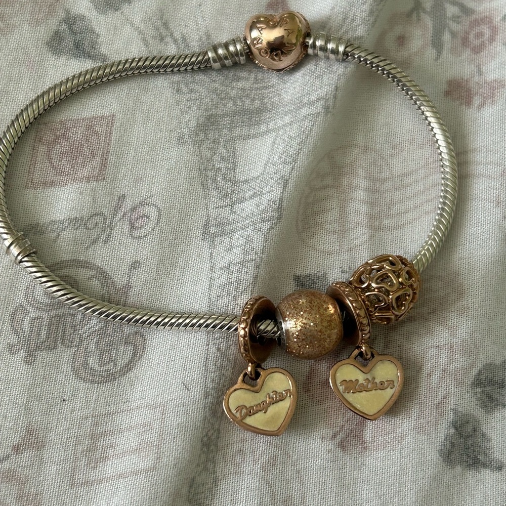 Rose gold pandora heart  bracelet with charms
